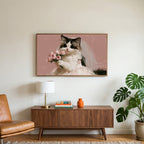 Cat bride art on a TV above a walnut credenza with a brass lamp and a monstera plant
