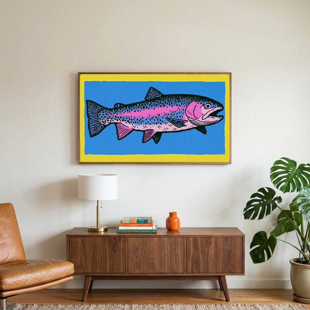 Rainbow trout art on a TV above a walnut credenza with a brass lamp and a monstera plant