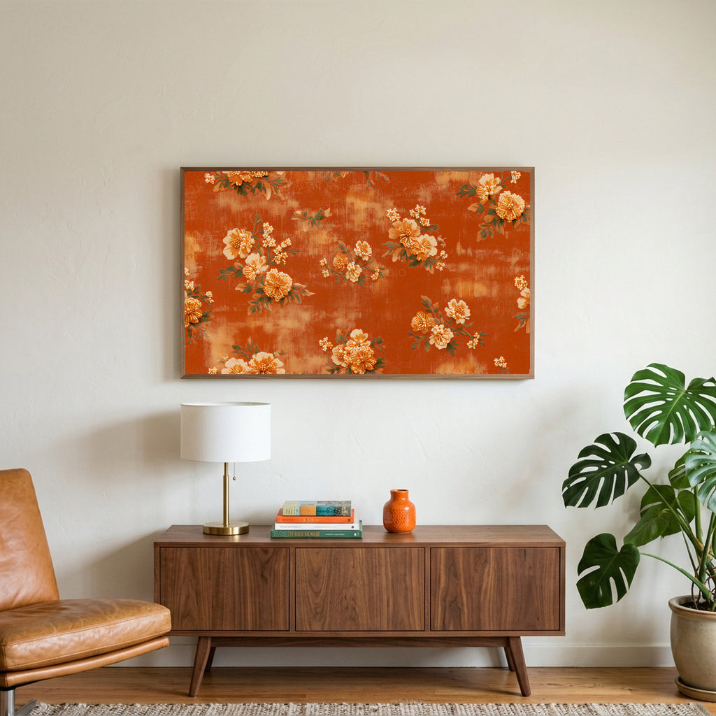 Beaded flowers art on a TV above a walnut credenza with a brass lamp and a monstera plant