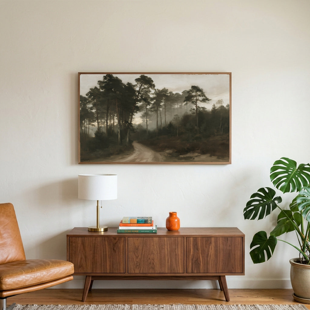 Misty pine forest path art on a TV above a walnut credenza with a brass lamp and a monstera plant