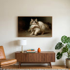 Kitten with a big fish art on a TV above a walnut credenza with a brass lamp and a monstera plant
