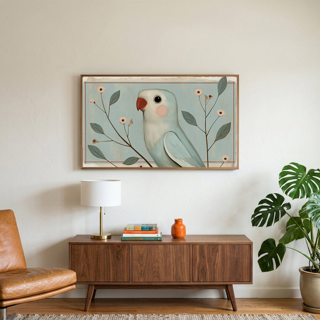 Vintage blue parrot art on a TV above a walnut credenza with a brass lamp and a monstera plant