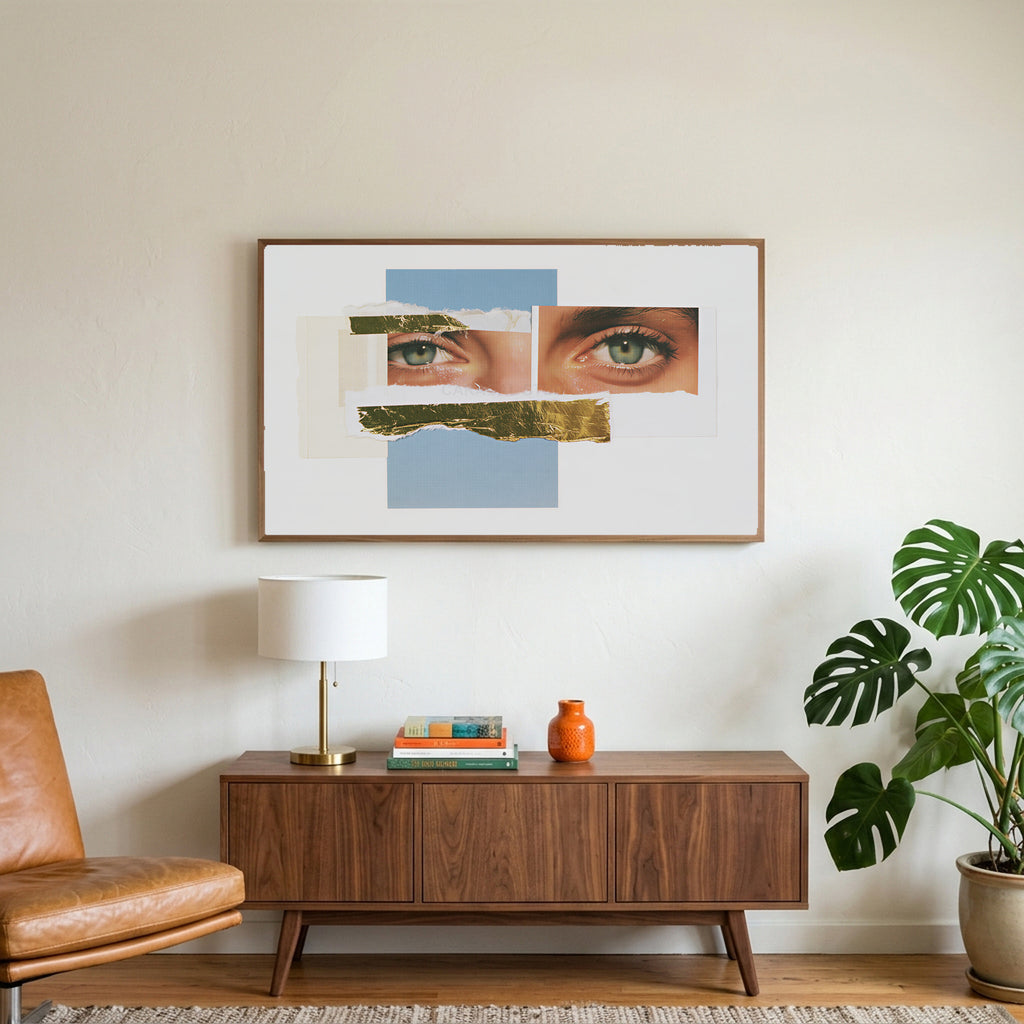 Eye collage art on a TV above a walnut credenza with a brass lamp and a monstera plant