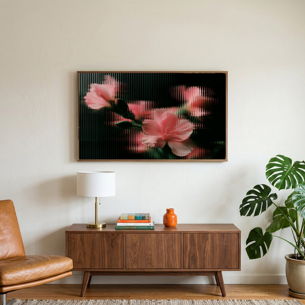 Ribbed glass flowers art on a TV above a walnut credenza with a brass lamp and a monstera plant