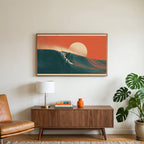Surfer on a wave art on a TV above a walnut credenza with a brass lamp and a monstera plant