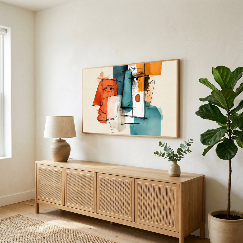 Side view of the Cubist faces TV art above a rattan sideboard next to a fiddle-leaf fig