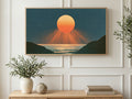 Sunset Sea Cove art on a TV in a living room