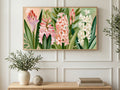 Pink and White Hyacinths art on a TV in a living room