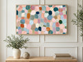 Pastel Pebble Mosaic art on a TV in a living room