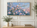 Pink Bud Branches art on a TV in a living room