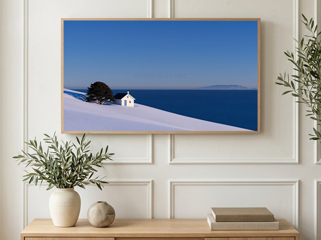 Snowy Seaside Cottage art on a TV in a living room