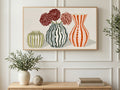 Striped Vases and Dahlias art on a TV in a living room