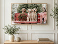 Red Truck Puppies art on a TV in a living room