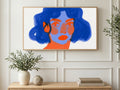 Cobalt Brushstroke Portrait art on a TV in a living room