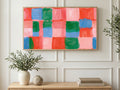 Brushstroke Color Checks art on a TV in a living room