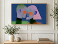 Heart Cheek Faces art on a TV in a living room