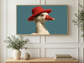 Red Hat Duck art on a TV in a living room