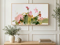 Pink Brushstroke Wildflowers art on a TV in a living room