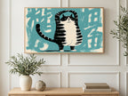 Yoga Tree Pose Cat art on a TV in a living room