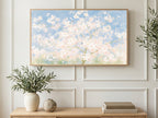 Pastel Cherry Blossoms art on a TV in a living room