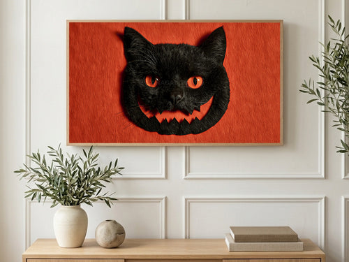 Carved Cat Lantern art on a TV in a living room