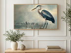 Snowy Lake Heron art on a TV in a living room