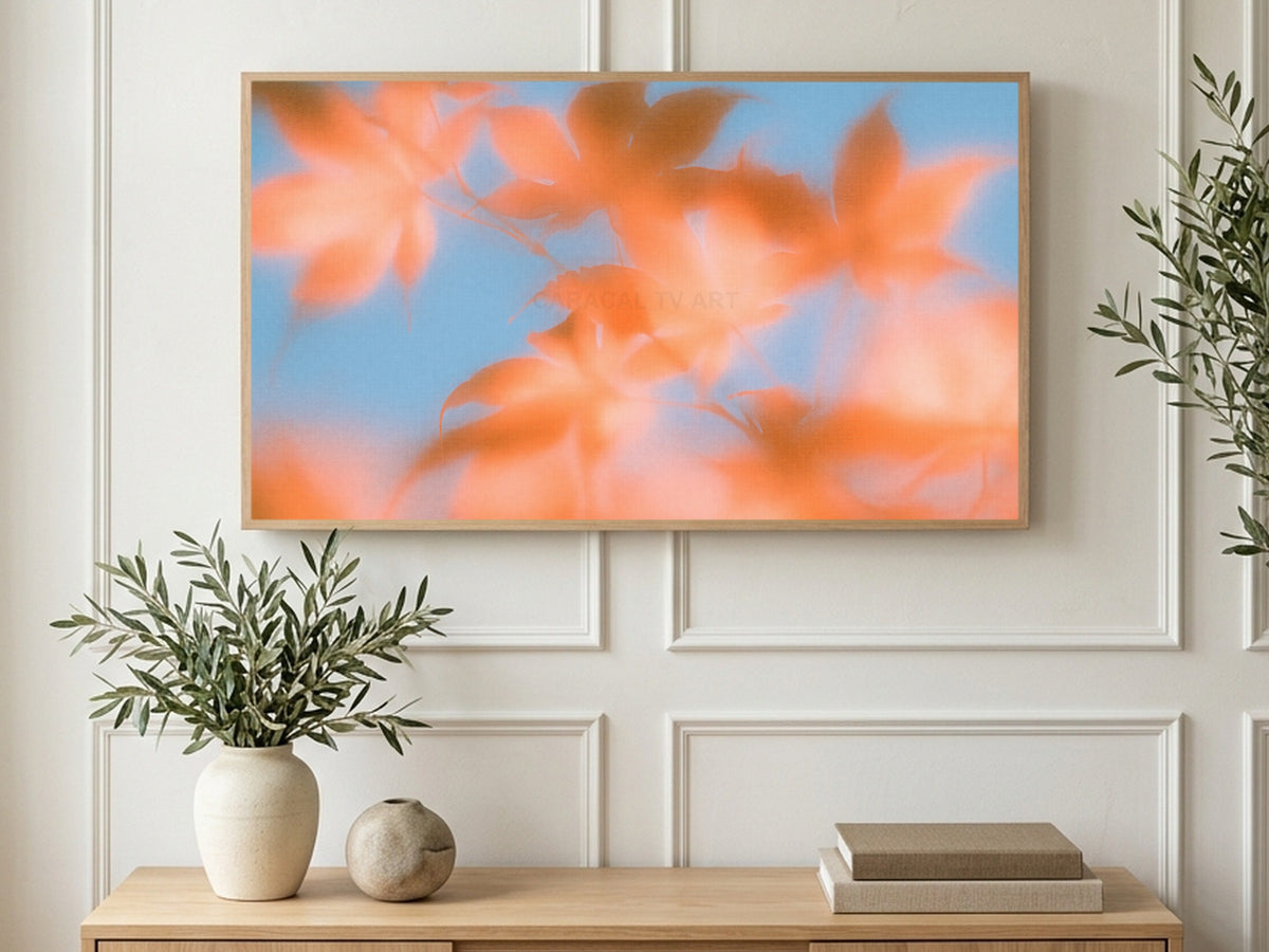 Blurred Autumn Leaves art on a TV in a living room