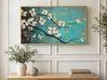 Teal Dogwood Branch art on a TV in a living room