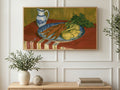 Carrots and Blue Pitcher art on a TV in a living room