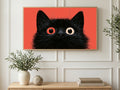 Coral Black Cat Stare art on a TV in a living room