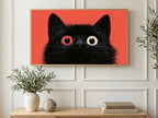 Coral Black Cat Stare art on a TV in a living room