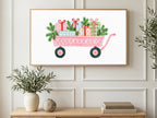 Pink Gift Wagon art on a TV in a living room
