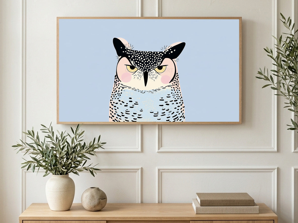 Grumpy Dotted Owl art on a TV in a living room