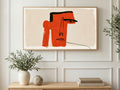 Red Block Profile Face art on a TV in a living room