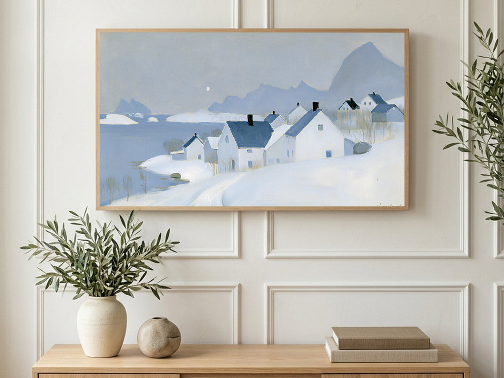 Snowy Seaside Village art on a TV in a living room