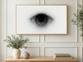 Fine Line Black Eye art on a TV in a living room