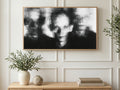 Blurred Photocopy Faces art on a TV in a living room
