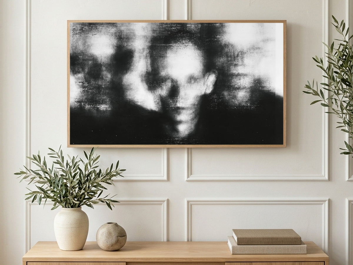 Blurred Photocopy Faces art on a TV in a living room