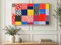 Polka Dot Patchwork art on a TV in a living room