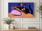Black Cat Birthday Cake art on a TV in a living room