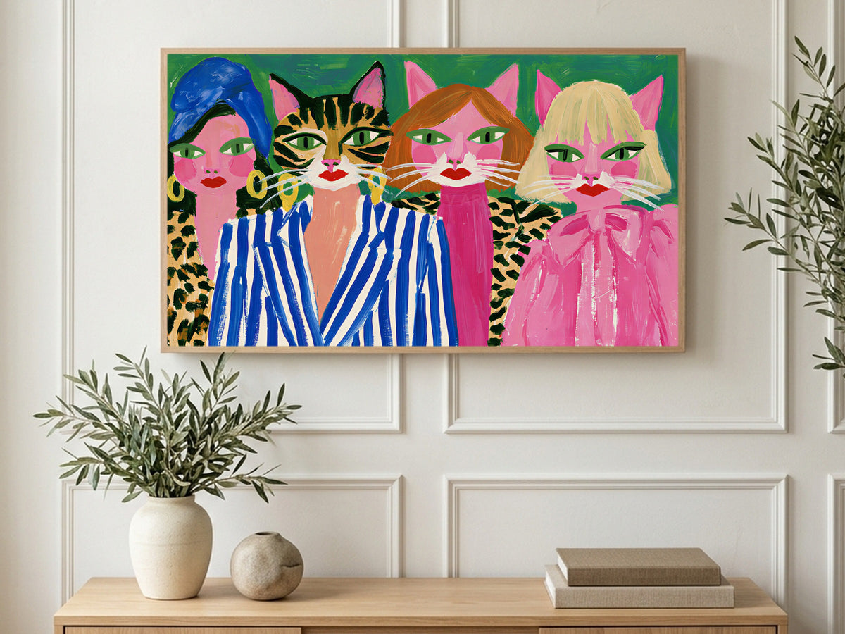 Cat Head Ladies art on a TV in a living room