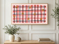 Blush Gingham Stars art on a TV in a living room