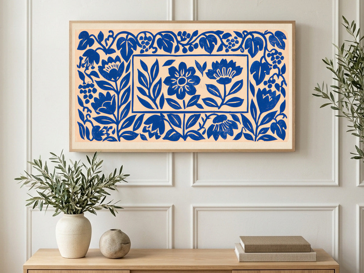 Blue Paper Cut Flowers art on a TV in a living room