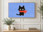 Red Scarf Kitten art on a TV in a living room
