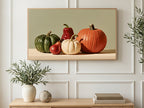 Pumpkins Pepper and Pear art on a TV in a living room