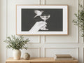 Bird on Champagne Coupe art on a TV in a living room