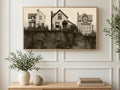 Three Cliffside Houses art on a TV in a living room