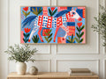 Folk Horse and Tulips art on a TV in a living room