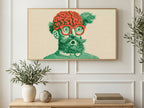 Big Brain Bearded Thinker art on a TV in a living room