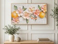 Blossoms and Oranges art on a TV in a living room